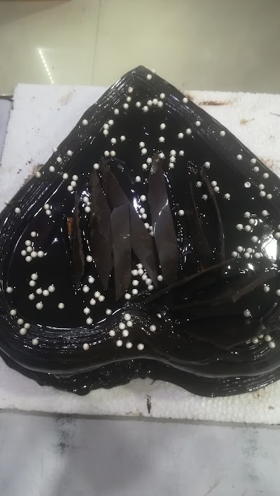 BAKEECYN9DMH_DINESH_BAKERY_ChIJaVcFqEgF8jkRYhHfIu-FWXo_8