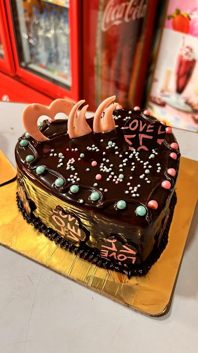 BAKEP6LKCOK7_The_Family_table_ChIJvVV992ND8jkRSLXFbNKdTZc_9